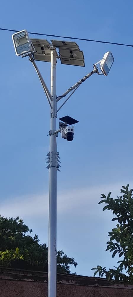Solar flood lights and camera on a pole